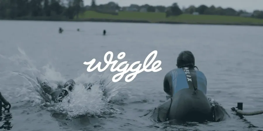 Wiggle wordmark over swimmers